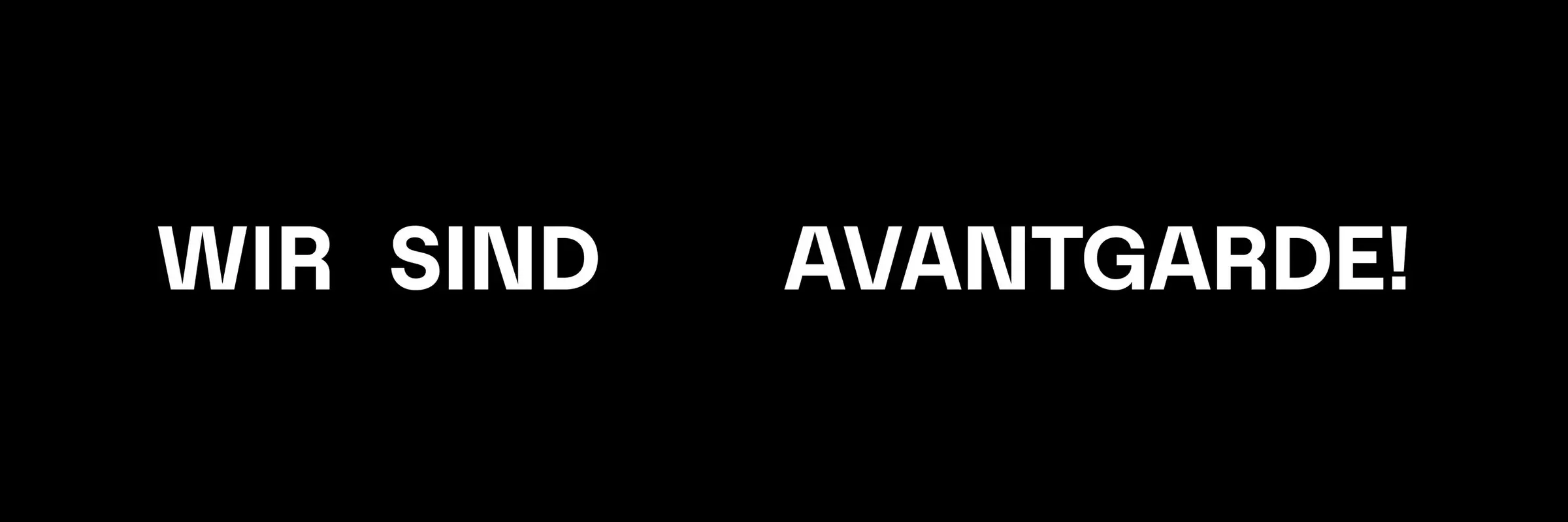 Die Worte WIR SIND AVANTGARDE! in weißer Schrift auf schwarzem Untergrund.